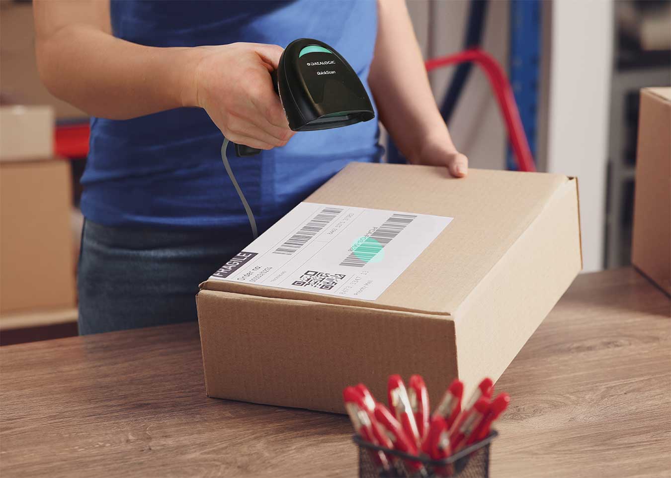 Datalogic QuickScan QD2200 Barcode Scanner in use (QD2220-BKK1S)