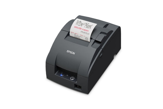 Epson TM-U220IIB impact dot matrix POS receipt printer with autocutter, dark grey (Epson Dark Grey), USB (C31CL27102B0) – left 3/4 view with receipt