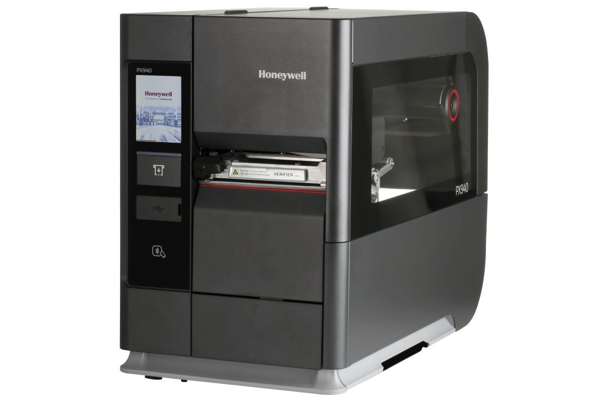 Honeywell PX940V industrial label printer with integrated barcode verifier, colour touch display, tear bar, 300 dpi, thermal transfer (PX940V30100000300) – angled view with clear media door